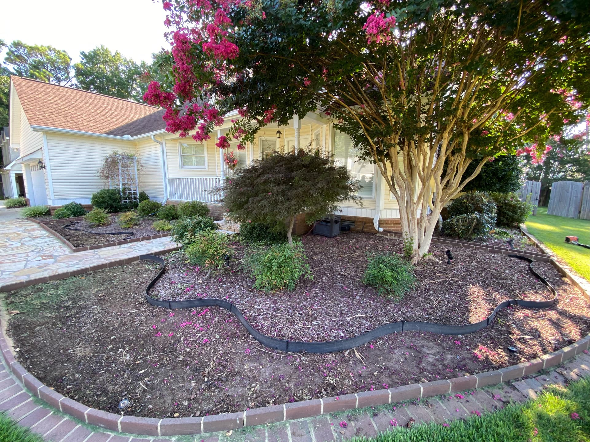 Front yard crepe myrtle bed — before